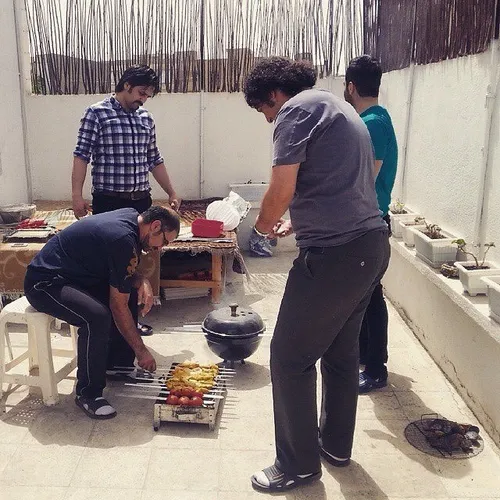 Friends get together on holiday and make Jujeh Kabab, an 