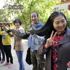 زن 35 ساله چینی که با موهای 3 متر و 38 سانتی خود، رکورد د