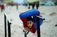 محمد الشیخ نوجوان 12 ساله ساکن غزه که به "اسپایدر من" غزه