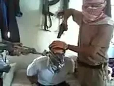 ویدیوی کشتن یک نفر توسط داعش!