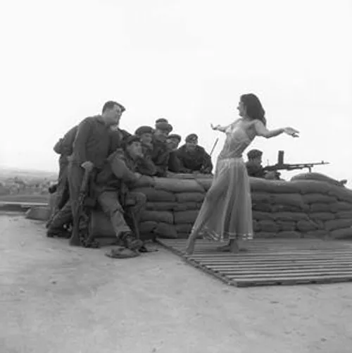 A belly dancer from Middlesex entertains British troops i