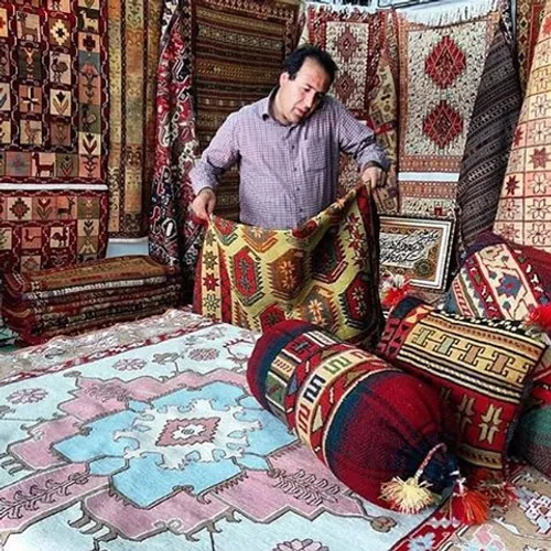A carpet and rug store. ParsAbad, Ardabil, Iran. Photo by