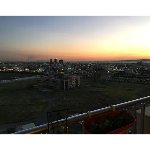 Balcony view in Erbil, complete with distant gas flares, 