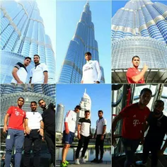 گشت و گذار سرخ پوشان در کنار بلند ترین برج دنیا