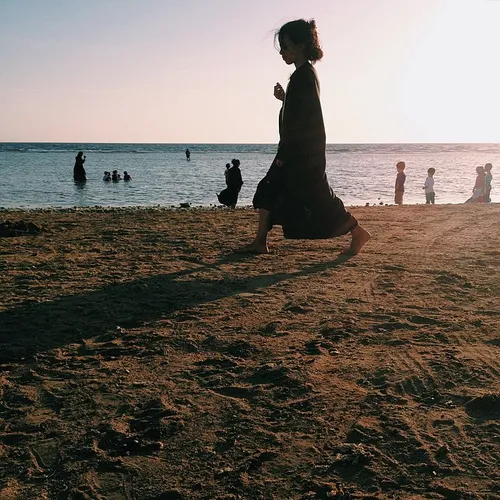 A girl at a public beach, Jeddah, Saudi Arabia, 2014. iPh