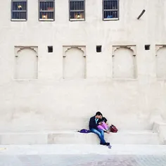 A couple shares an intimate moment in old #Dubai. Photo b
