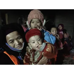 A grandmother and her 7 months grandson gathers with neig