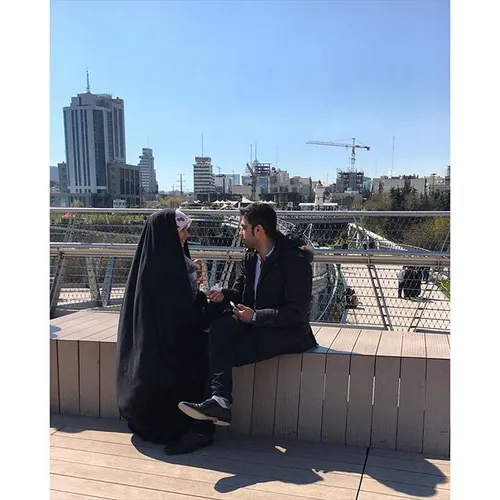 A couple are enjoying their moments on the Tabiat pedestr