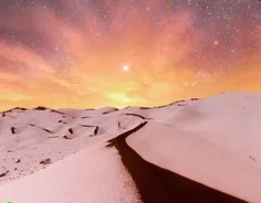 صحنه‌ای چشم‌نواز از برفی که تپه‌های شنی را در کویر مرنجاب