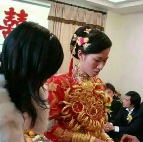 دختری چینی که در شب عروسی اش 10 کیلو طلا هدیه گرفت و توان
