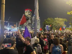 📷 برافراشتن پرچم فلسطین در تجمع امشب صهیونیست‎‌ها علیه نت