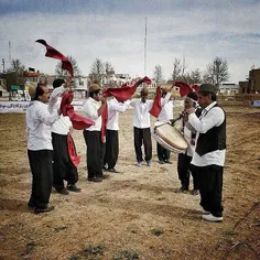 Men perform a traditional dance on the opening day ceremo