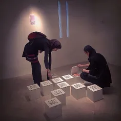 People visiting an exhibition of avant-garde visual artis