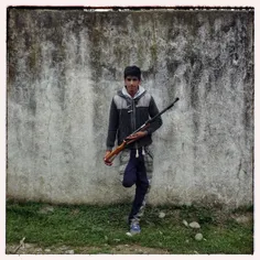 Portrait of a young boy with his air gun, near #Babolsar,