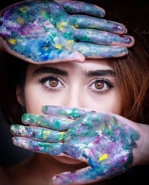 a artist with coloring hands