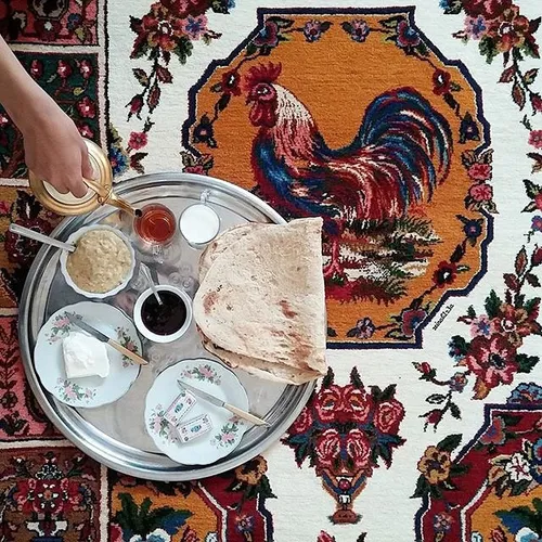 Having breakfast on a handmade carpet. ShahreKord, Chahar