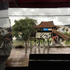Rainy day seen thru the view of a window cafe in outskirt