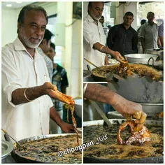 آشپز هندی به نام پریم سینگ که برای آشپزی دستش را داخل روغ