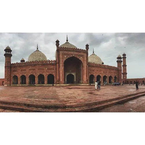 People spending a beautiful rainy day in Lahore at the Ba