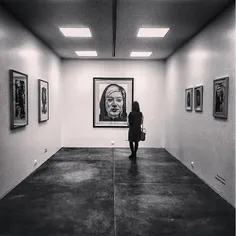 A woman visits a drawing exhibition. #Tehran, #Iran. Phot